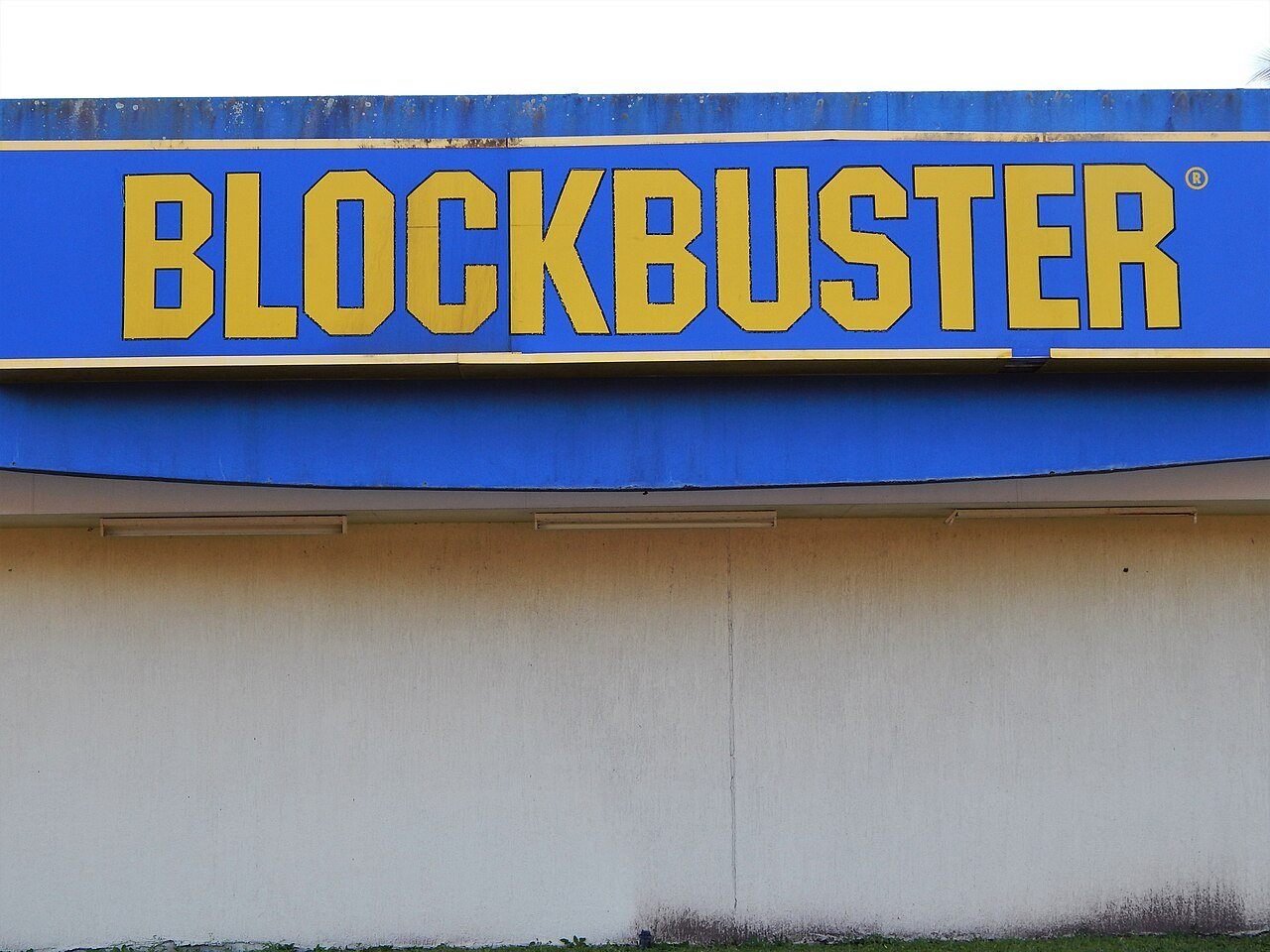 Blockbuster: Signage on a Blockbuster Video building in the regional Queensland city of Rockhampton, Queensland in 2014, prio