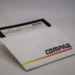 Compaq Fell From Record Growth to Obscurity — Old Compaq branded floppy disk for setup and diagnostics with sleeve.