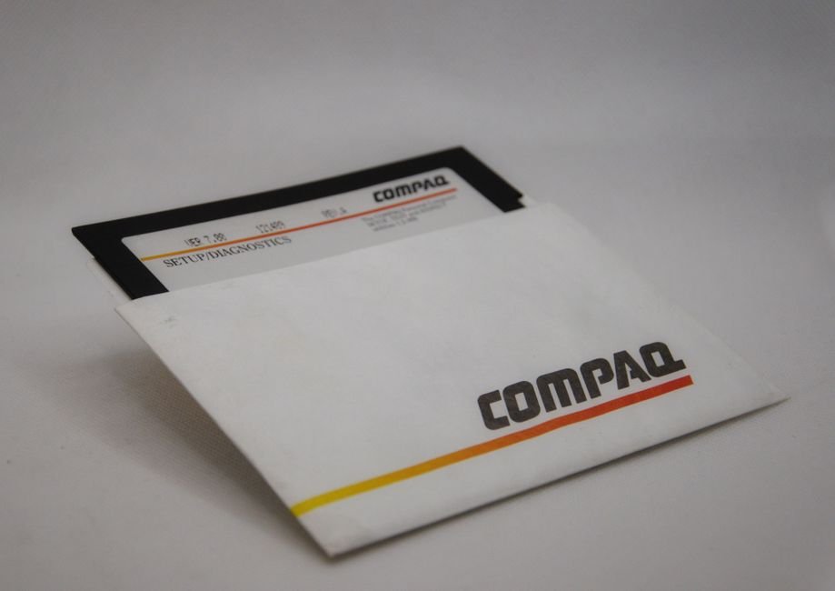 Compaq Fell From Record Growth to Obscurity — Old Compaq branded floppy disk for setup and diagnostics with sleeve.