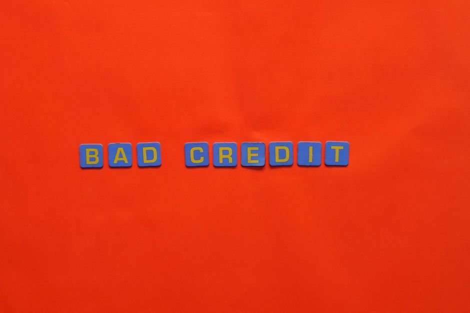 From Bankruptcy to — Blue letter blocks spelling 'Bad Credit' on an orange background.
