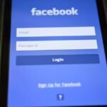 Myspace Lost 100 Million Users — Close-up of a smartphone screen showing the Facebook login interface.