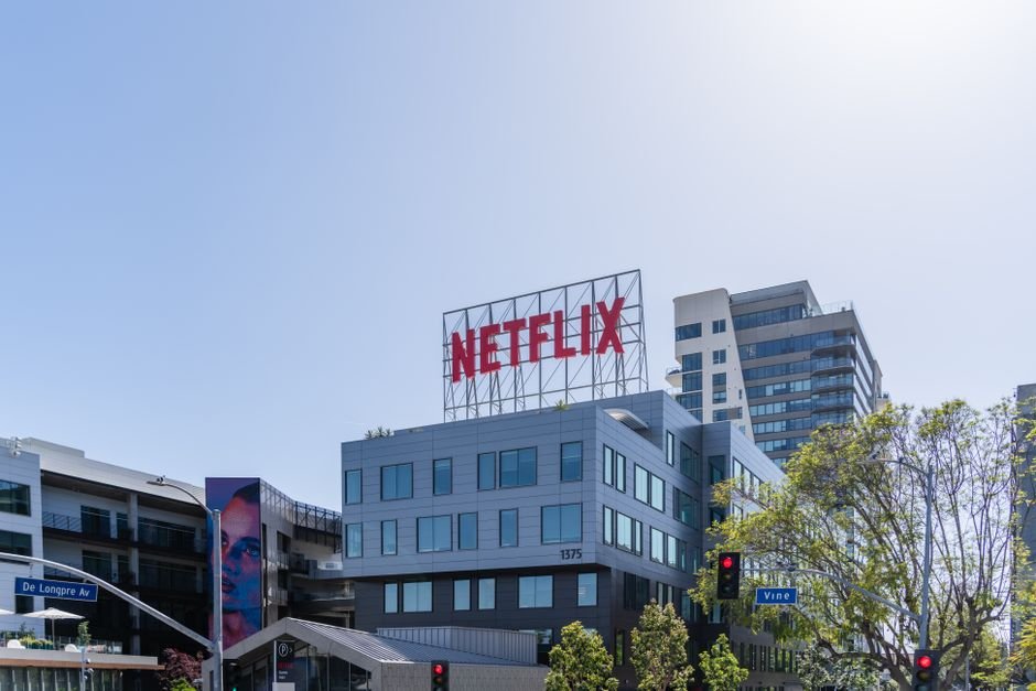 Streaming Wars Are Quietly Bankrupting Giants — Exterior view of Netflix headquarters in Los Angeles under a clear sky.