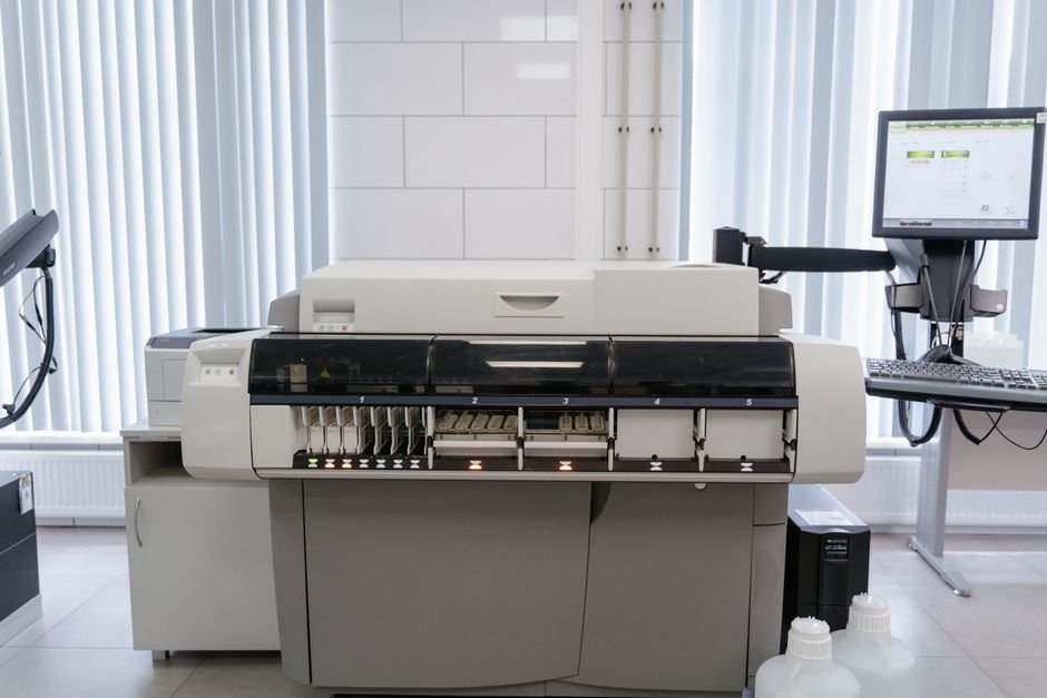 Xerox — A high-tech office setup featuring a printer and computer workstation ready for productivity.